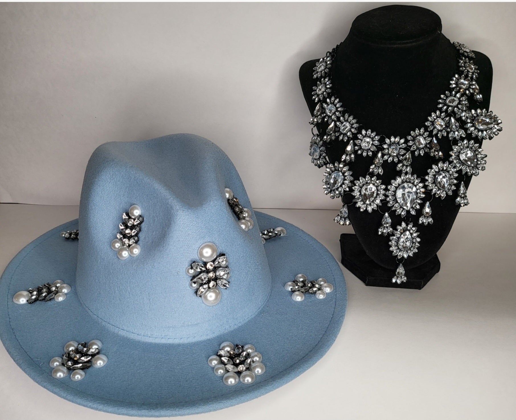 Fedora light blue with custom jewelry
